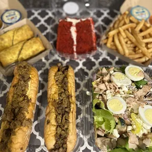 Philly Cheesecake Eggrolls, Red Velvet Cake, NON greasy fries, Made to Order Salad, Chop Cheese Stinger &amp; Philly Cheesesteak Subs