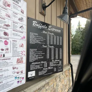 a menu on the outside of a restaurant