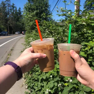 Iced almond oat milk latte on left and mocha on right. Both AMAZE