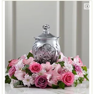 This is how the flowers should hug the urn (we had different colors, but the fullness should have been more like this)