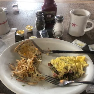 Omelet, toast, and lighter-than-air hash browns