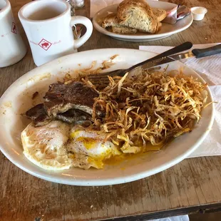 Today&apos;s special is Pork chops and eggs with hashbrowns