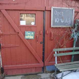 Hours of operation, front entry door.