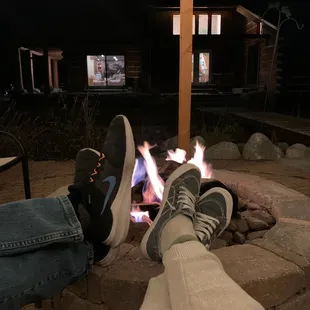 Kicked back, literally, at the fire pit in a silo.
