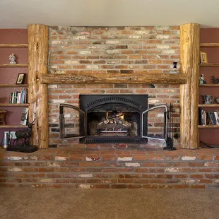 Living Room with a Fireplace - Buffalo Peaks Lodge