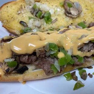 Philly Cheese Steak hoagie with Fat tire dipping cheese  from Buffalo Pizza
