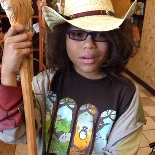 Animal head walking sticks. Why? And so many straw cowboy hats!