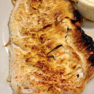Lake white fish seared and served with lemon butter. Delicious.
