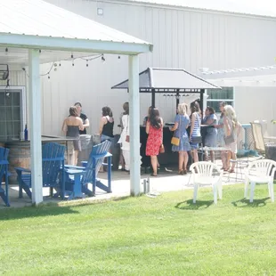 a group of people standing outside a building