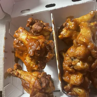 Wings with barely any sauce.