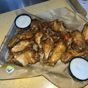 Uncooked , freezer burnt wings that were "fresh" out of the fryer lmao