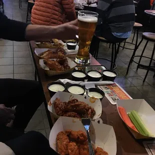 All cold wings!!! Ridiculous wait time an hour +,and waiter brought veggies with no dressing......