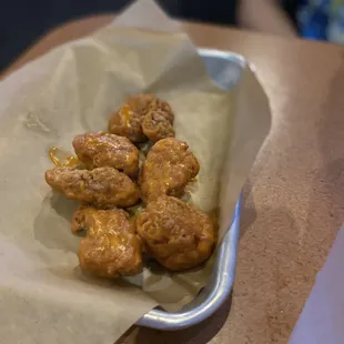 Buy a burger get 6 boneless wings for $1