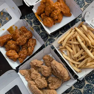 Spicy garlic (top R) golden fire (top L) dry rub lemon pepper​ (bottom L) and seasoned fries 9.19.2024