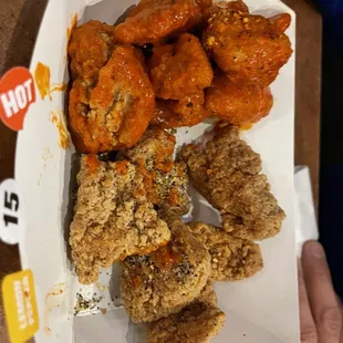 Boneless 15 Piece Wings lemon pepper and hot. Both old and cold, this is what we were served and you can see how they look dry and rewarmed!