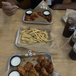 10 Boneless Wings (asian zing and spicy garlic) 10 Boneless Wings (honey bbq and spicy garlic) French fries