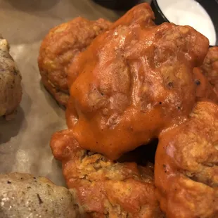 Sauce was crusted on the chicken. Not freshly tossed in sauce.