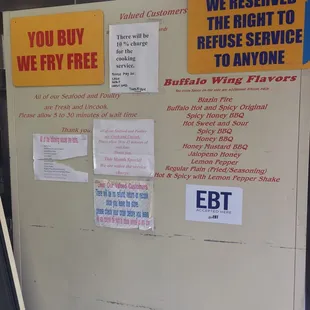 a refrigerator with a lot of stickers on it