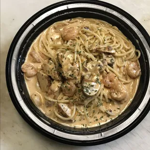 Cajun House Pasta
Cajun Alfredo Sauce, Shrimp, Chicken Mush rooms , White onions.