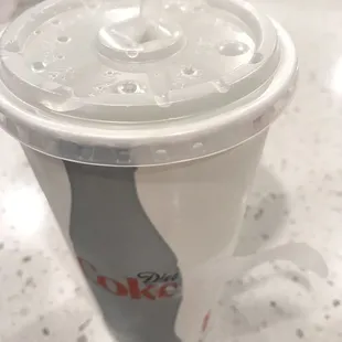Drink. Very thoughtful they tape straw to cup for easy carry out