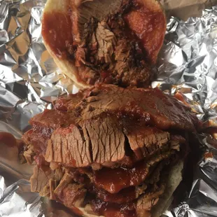 a pulled pork sandwich with barbecue sauce