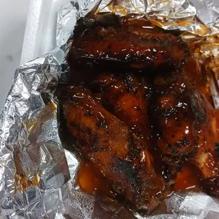Mango habanero wings (2 pcs already eaten)