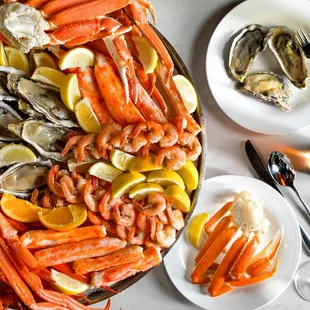 a platter of seafood and vegetables