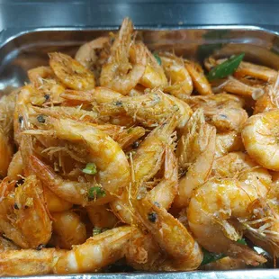 a tray of cooked shrimp