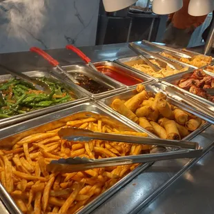 Lunch items. Wraps, fries, beans, and pot stickers