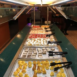 a variety of pastries on trays