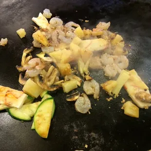 a pan of food being cooked