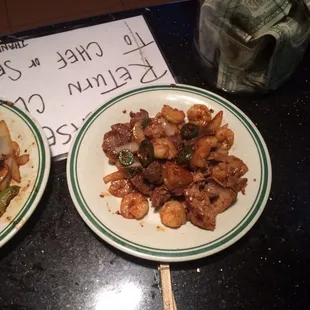 two plates of food on a counter