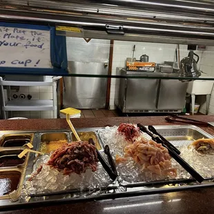 Meat on ice looks fresh and is grilled right in-front of you.