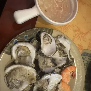 Seafood soup, oysters and shrimp