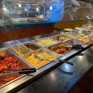 a buffet with many different types of food