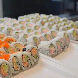 a variety of sushi rolls