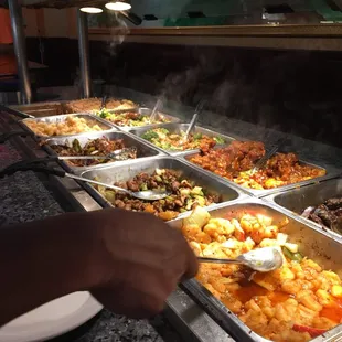a buffet with many different types of food