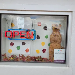 an open sign in a window