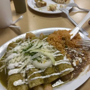 Shrimp green enchiladas and they served tamales for appetizers