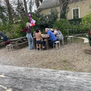 People enjoying the food and beer