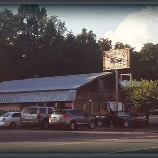 cars parked in front of it