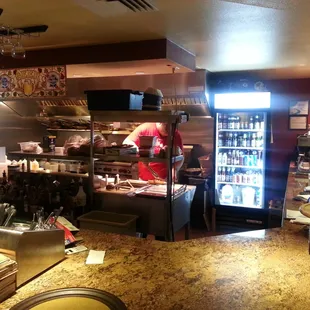 Exposed kitchen! Fun to watch food being cooked!