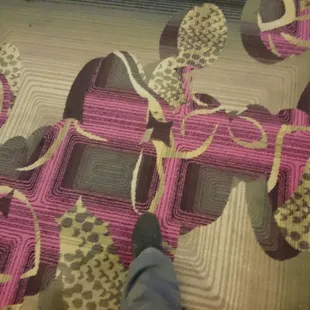 a person standing on a carpet