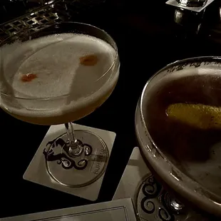 two cocktails on a bar counter