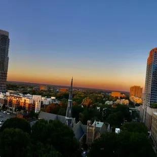a view of a city at sunset