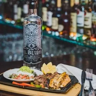 Chicken and Steak Fajitas are mmmmmmm. With a shot of Buho's artesanal Mezcal are a good pair.