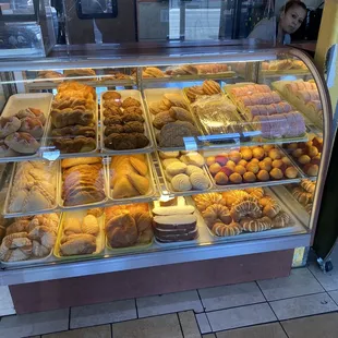 a display case full of baked goods