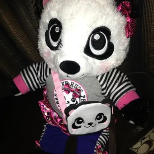 Panda with clothes, purse and bow