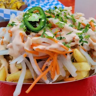 a plate of food on a red table