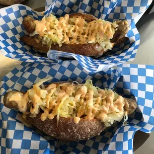 Reuben Bräts served on a locally made artisan rye roll with melted Swiss, Britt&apos;s sauerkraut, and thousand island sauce